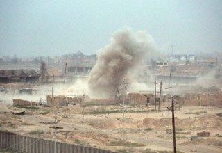 Koalisyon güçleri IŞİD'in elindeki Tikrit'i bombalıyor